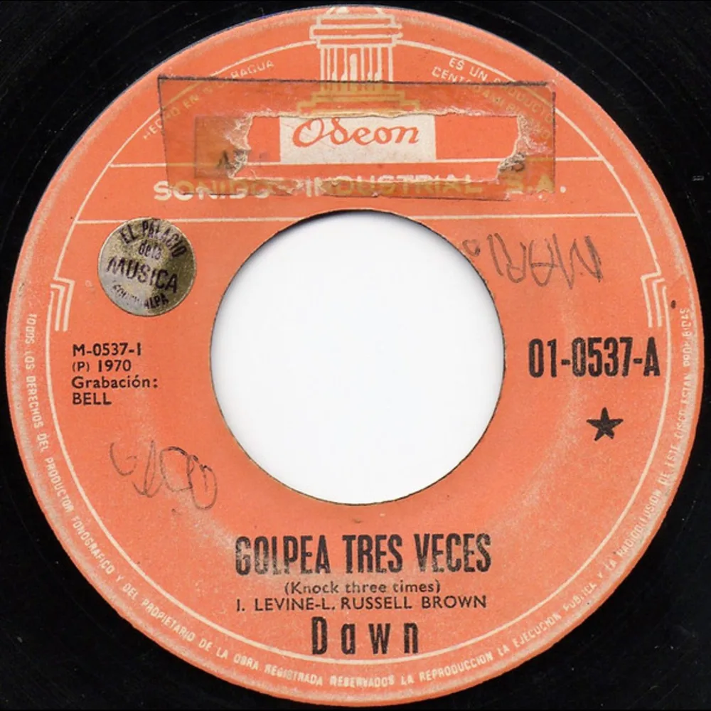 Dawn - Golpea Tres Veces = Knock Three Times / El Amor En Tus Ojos = The Love In Your Eyes